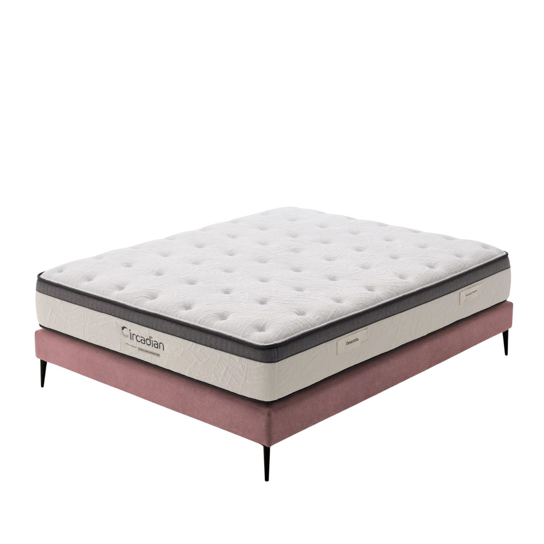 Studio view of the Circadian Mattress showing its quilted top and contrasting side panels.