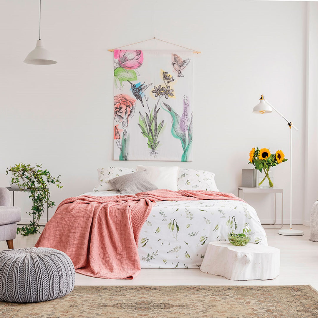 Bedroom scene featuring the Classico viscose rug paired with soft décor.