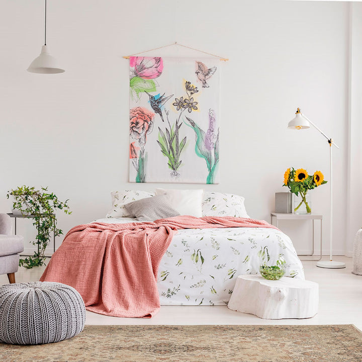 Bedroom scene featuring the Classico viscose rug paired with soft décor.