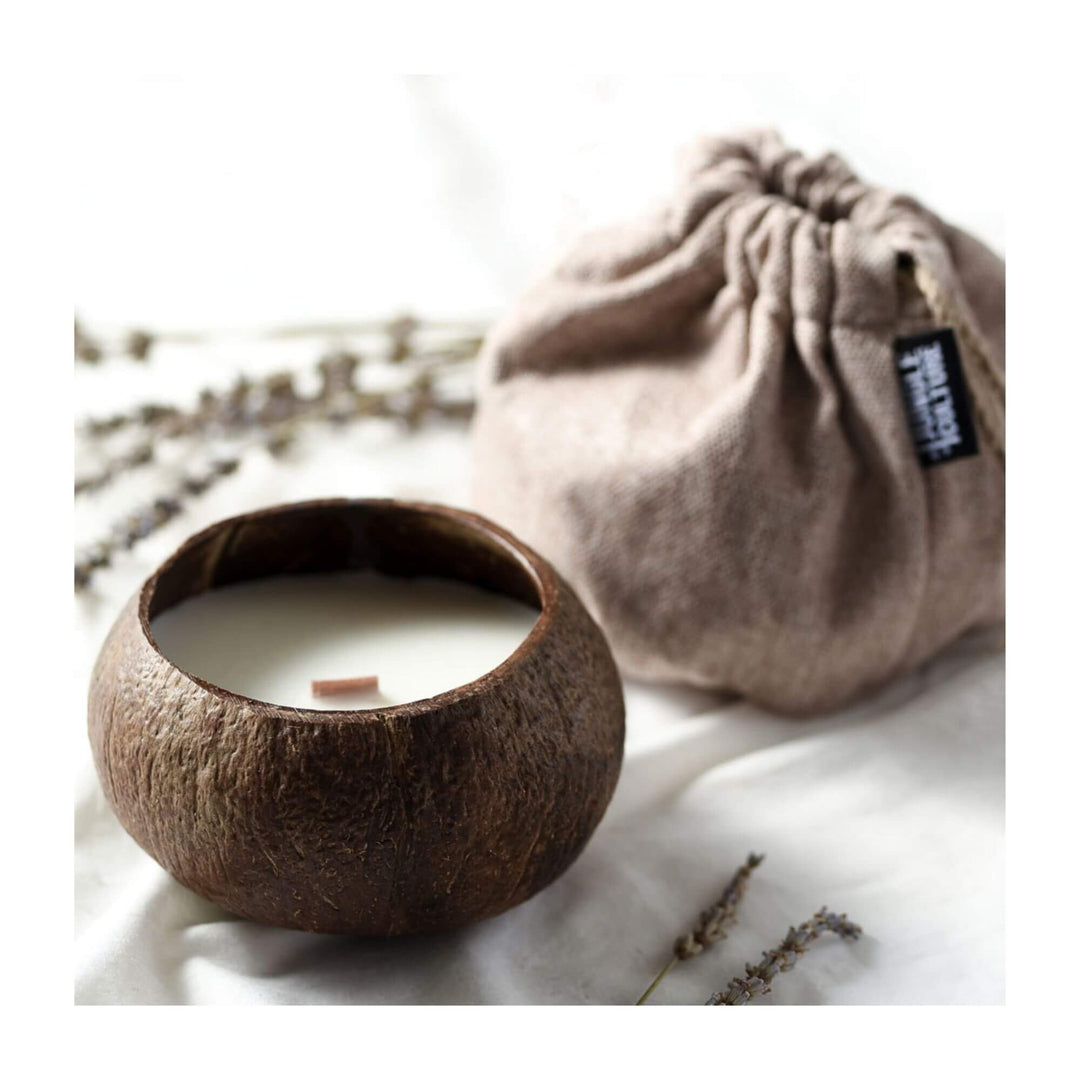 Coco candle with citric lime scent in natural coconut shell