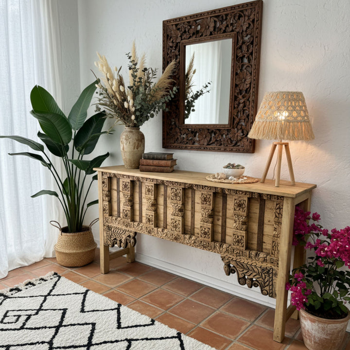 Interior setting featuring the console table styled with decor and artwork.