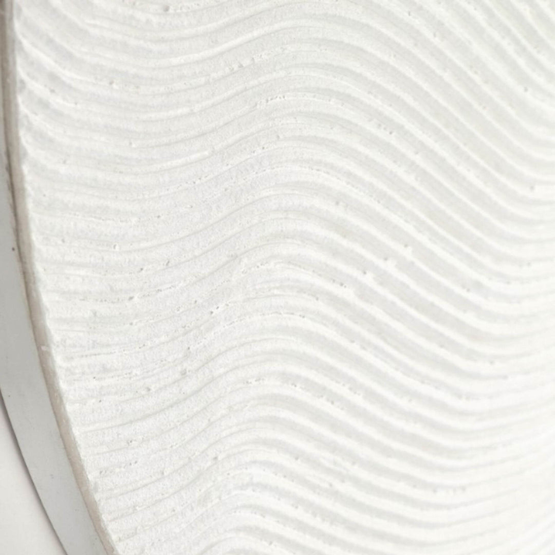 Close-up detail highlighting the flowing carved lines on the linen canvas surface.