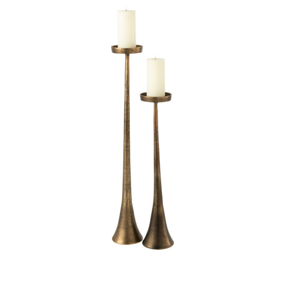 Group view of Copper Candle Stands in two heights showcasing their slender metal silhouettes and antique finish.