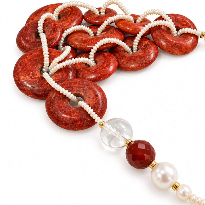 Close-up of sponge coral and pearl strands on the Coral Ember Necklace