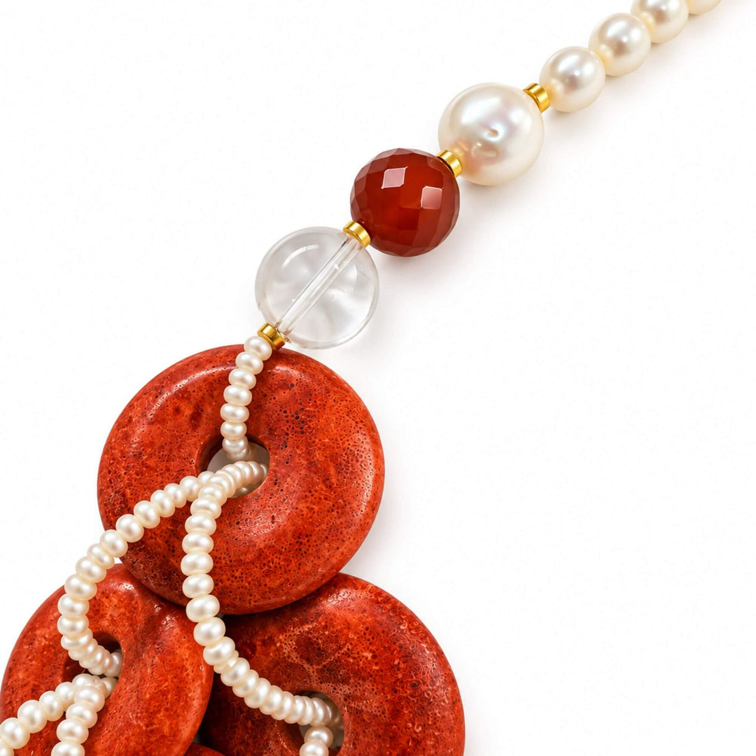 1. Close-up of carnelian agate, rock crystal, pearls and sponge coral details
