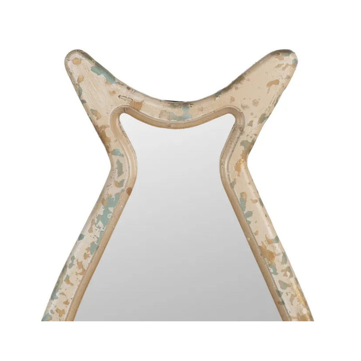 Upper detail of fish-shaped mirror frame