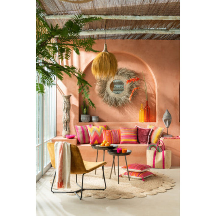 Styled interior view featuring Coral jute cushion collection on seating area