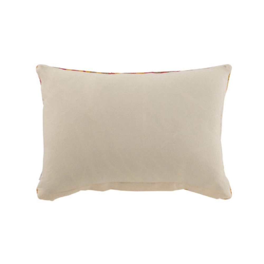 Back of Coral jute cushion with cotton backing styled in a warm, coastal interior