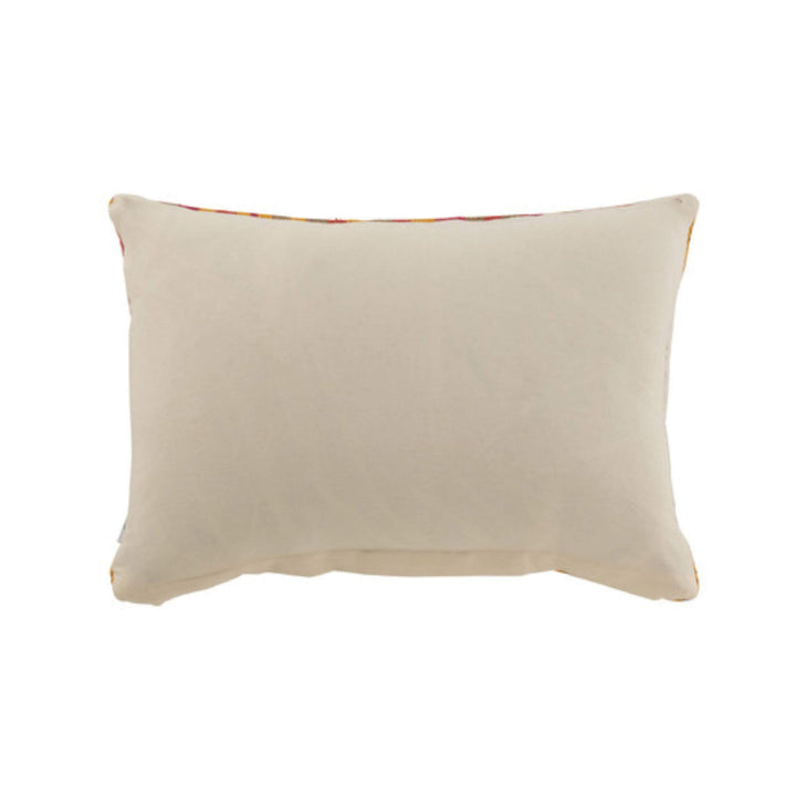 Back of Coral jute cushion with cotton backing styled in a warm, coastal interior