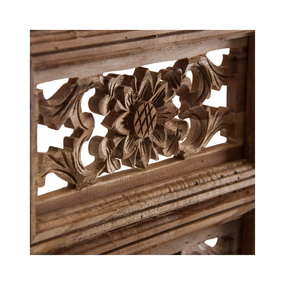 Close-up of rustic wall decor made from natural reclaimed wood.