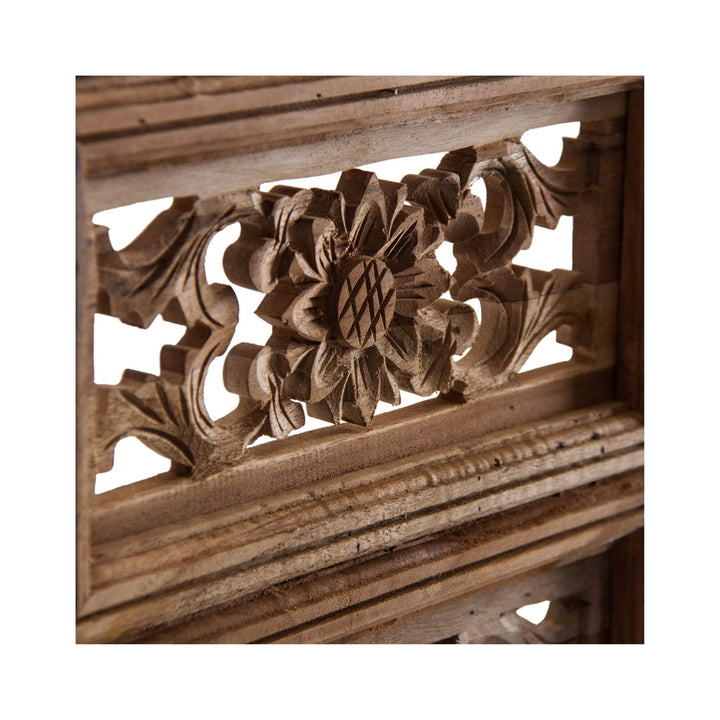 Close-up of rustic wall decor made from natural reclaimed wood.