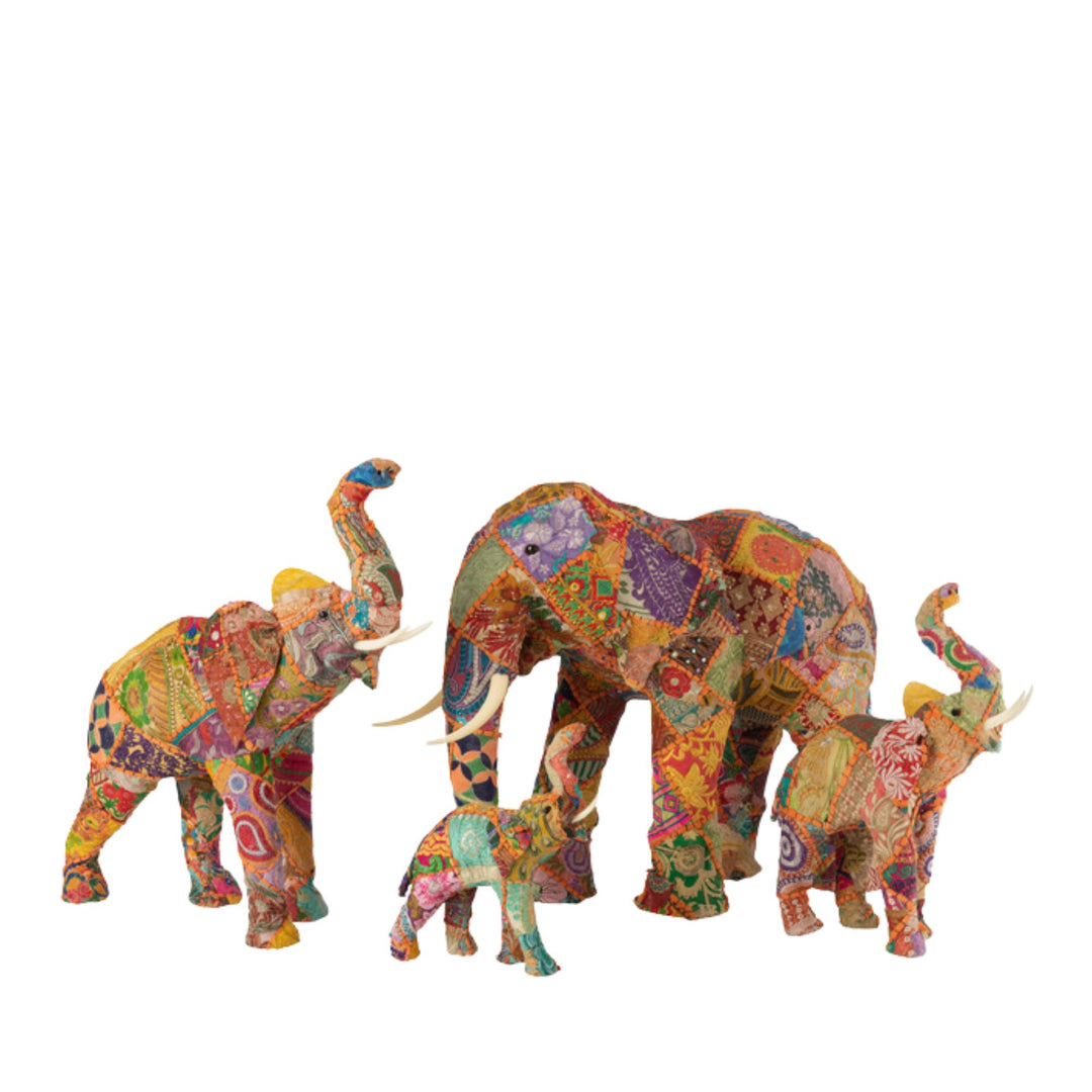 Group view of Cotton Patches Elephant sculptures in various sizes featuring colorful textile patchwork.