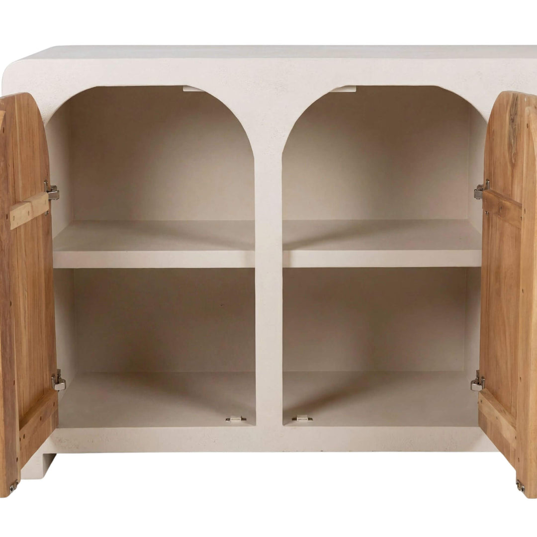 Open cabinet view showing the interior storage shelves behind the arched doors.