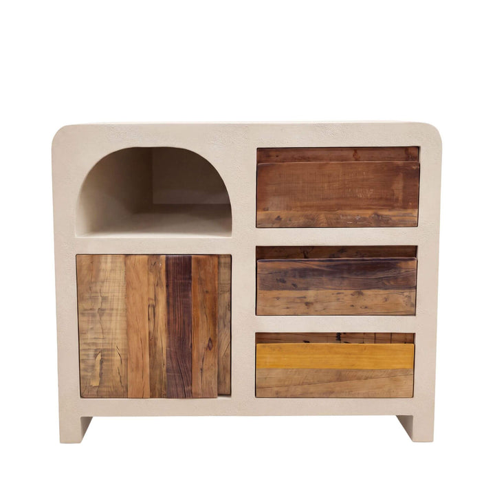 Front view of the Creta buffet combining a warm beige cement structure with multitone recycled wood doors and drawers