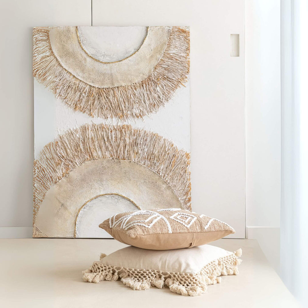 Decorative Creta Painting with geometric patterns on a white wall, accompanied by matching pillows.