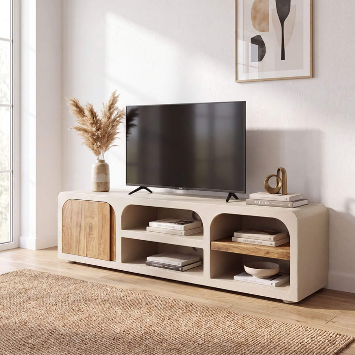Creta TV console styled beneath a television in a warm neutral Mediterranean living room