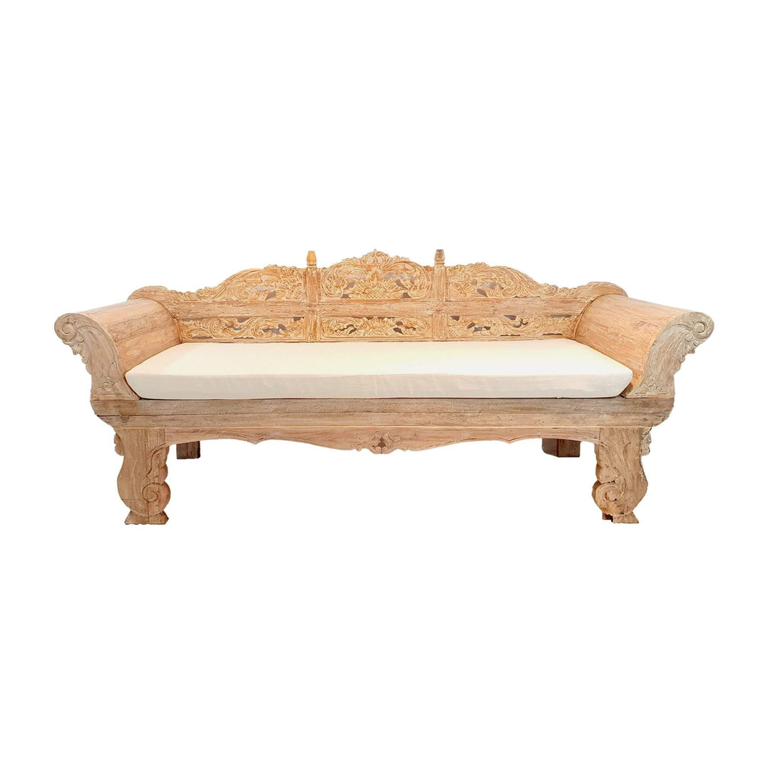 Front view of Cronus carved teak wood daybed with intricate floral details