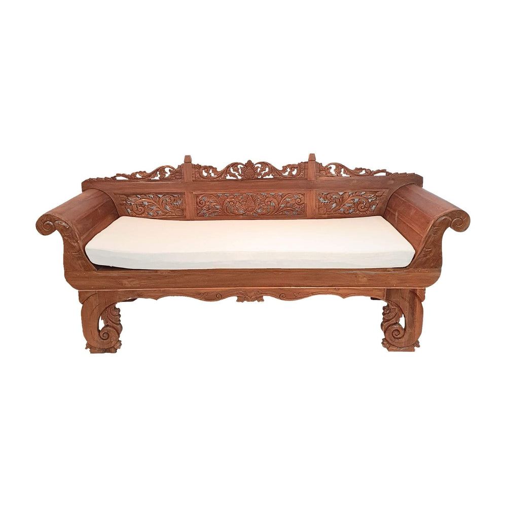 Front view of Cronus carved teak wood daybed with intricate floral details