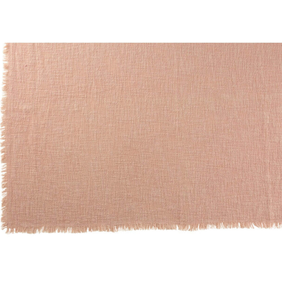 Close-up view of Cuad Rosa plaid fabric showing delicate fringe detail