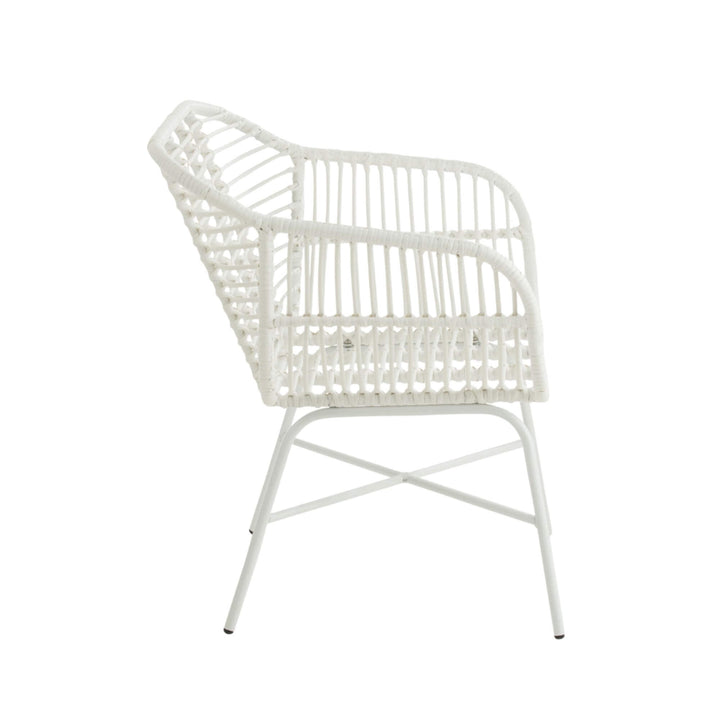 Side view showing woven rattan seat and curved armrests