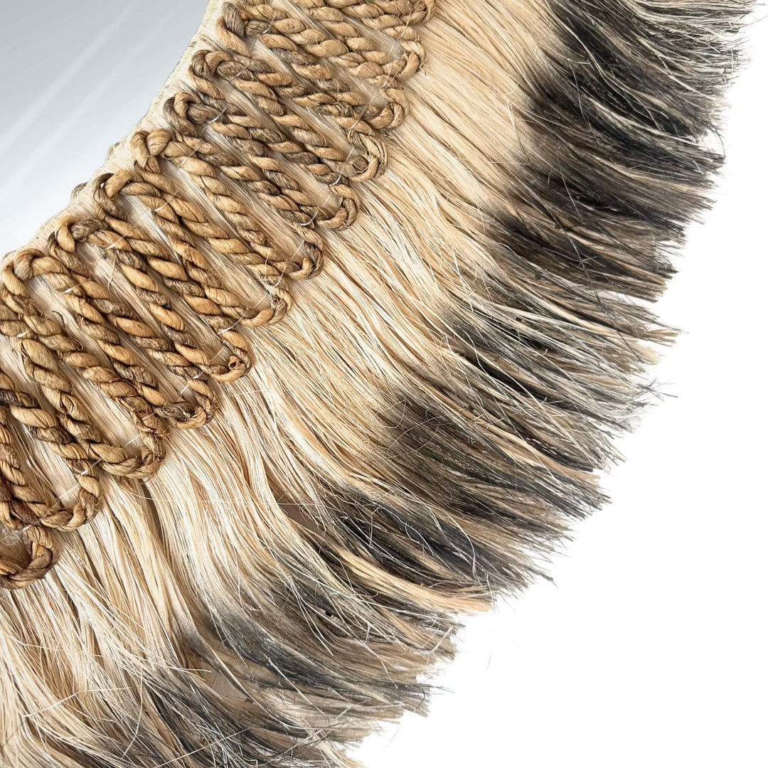 Close-up of Large Cendana Mirror round design with natural fiber frame in earthy tones, handmade and available in two sizes.