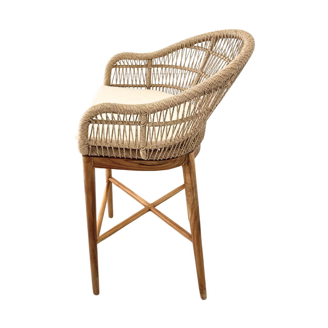 Side view of Coco Bar Stool showing natural teak frame and woven rattan design
