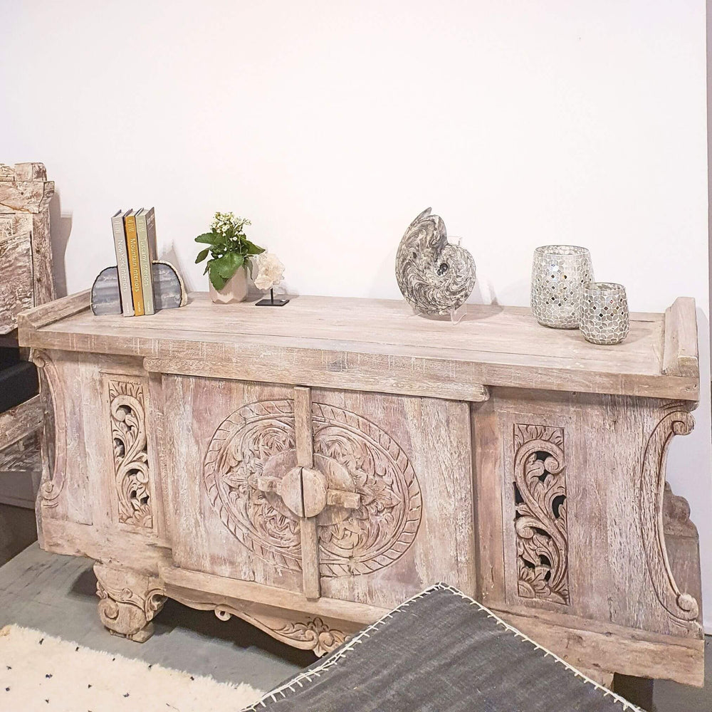 Cybele Carved Teak Wood Buffet styled in a living room setting