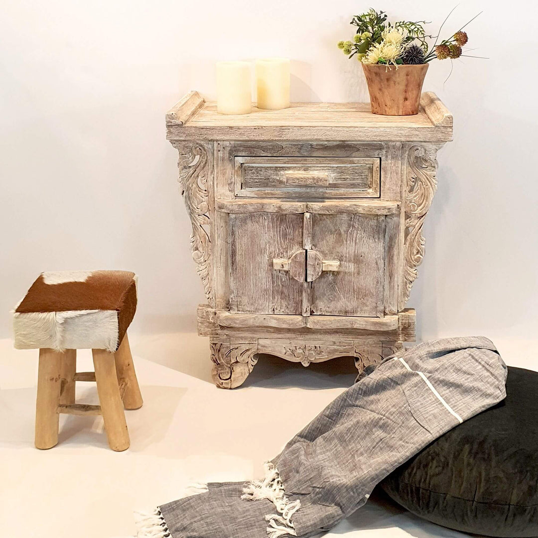 Compact teak wood sideboard with carved base and decorative panels