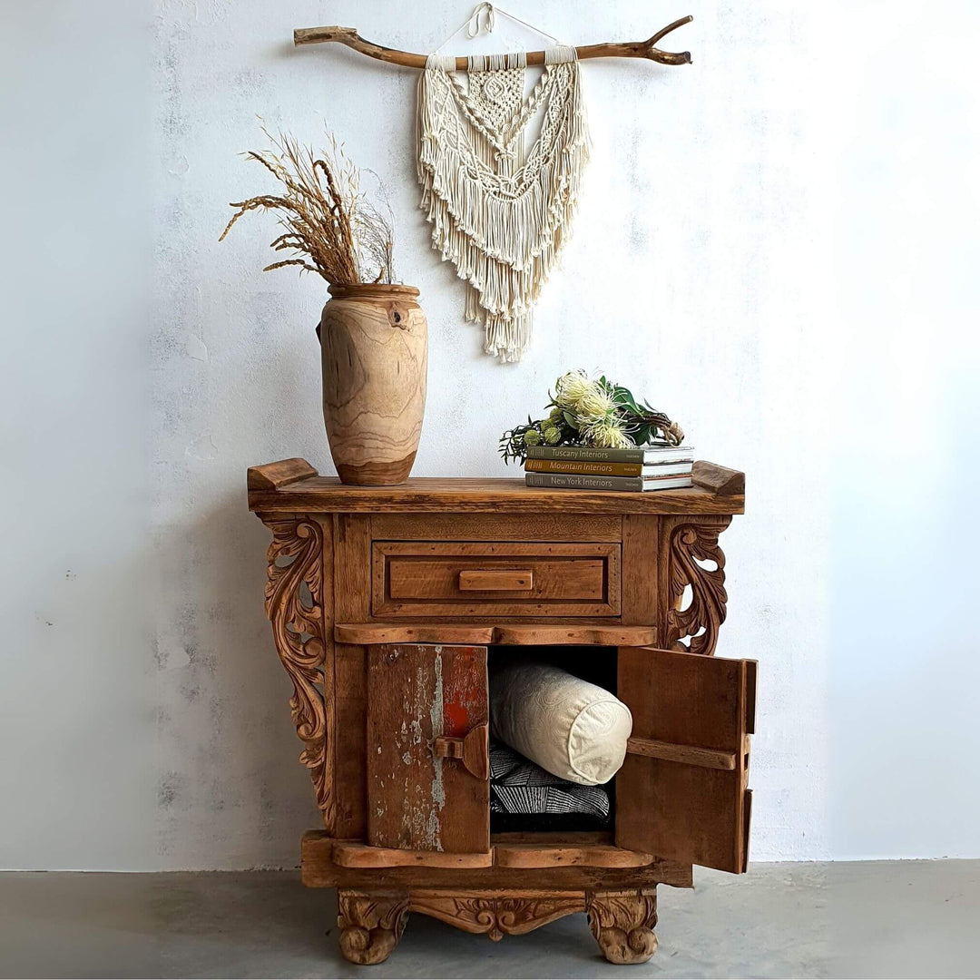 Recycled teak buffet styled in a natural-toned living room setting