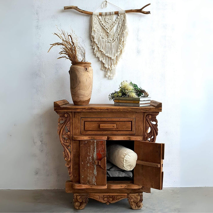 Recycled teak buffet styled in a natural-toned living room setting