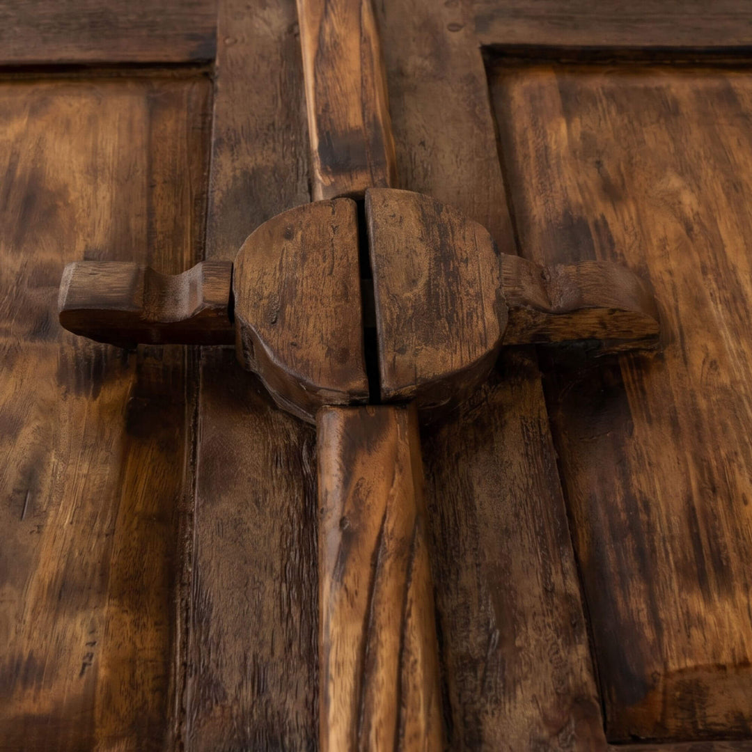 Close-up detail of the central wooden latch and reclaimed teak wood texture.