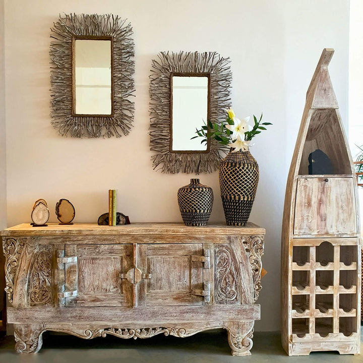 Dalia teak buffet styled in a tropical-inspired living room
