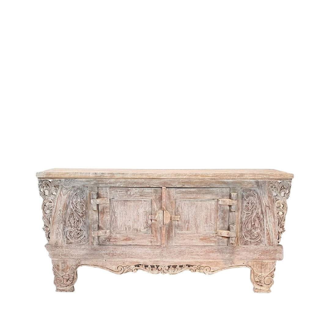 Dalia carved teak wood buffet with intricate carvings on a white background