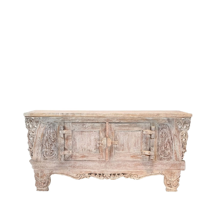 Dalia carved teak wood buffet with intricate carvings on a white background