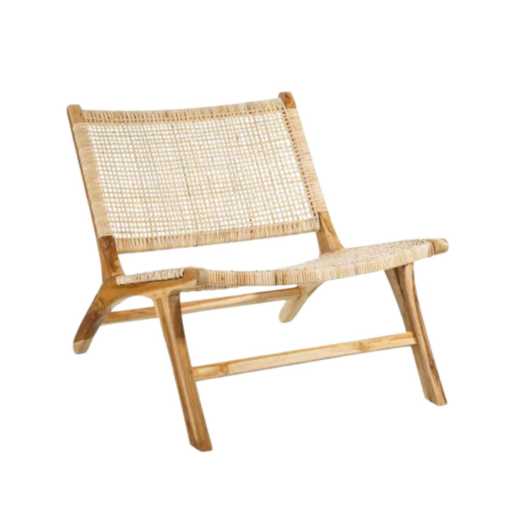 Angled view of Dane lounge chair showing low profile and solid teak frame