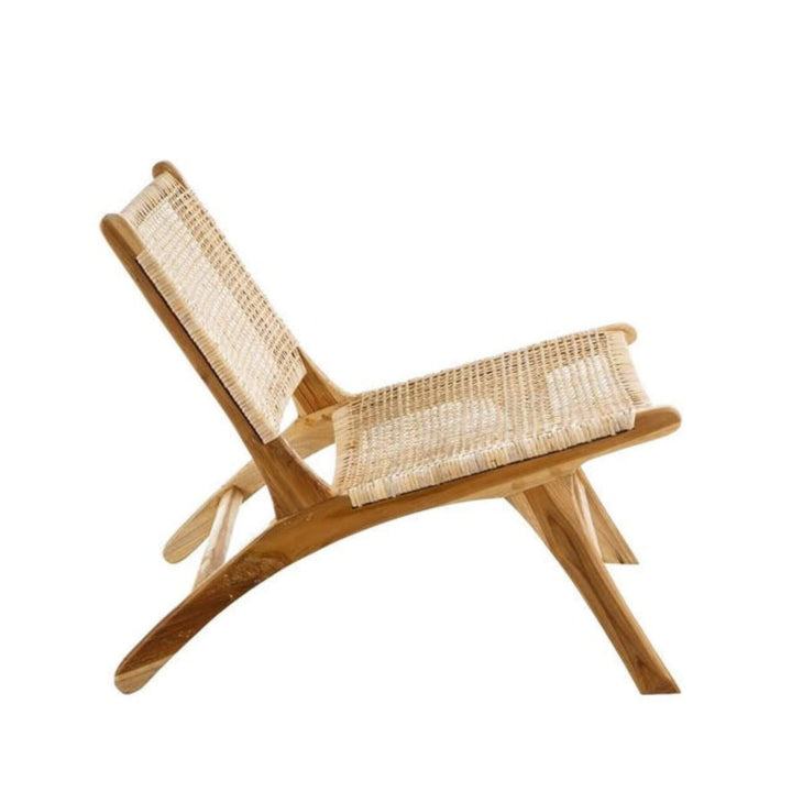 Side view of Dane lounge chair showing low profile and solid teak frame