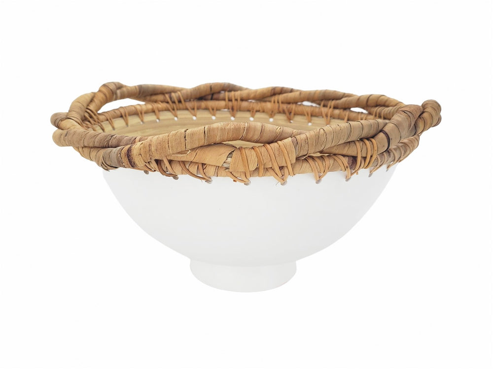 Natural bamboo bowl with woven rim detail, ideal as a decorative centerpiece.


