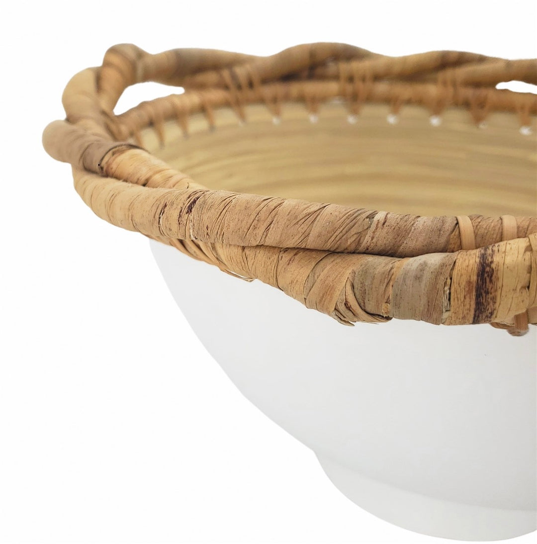 Natural bamboo bowl with woven rim detail, ideal as a decorative centerpiece.