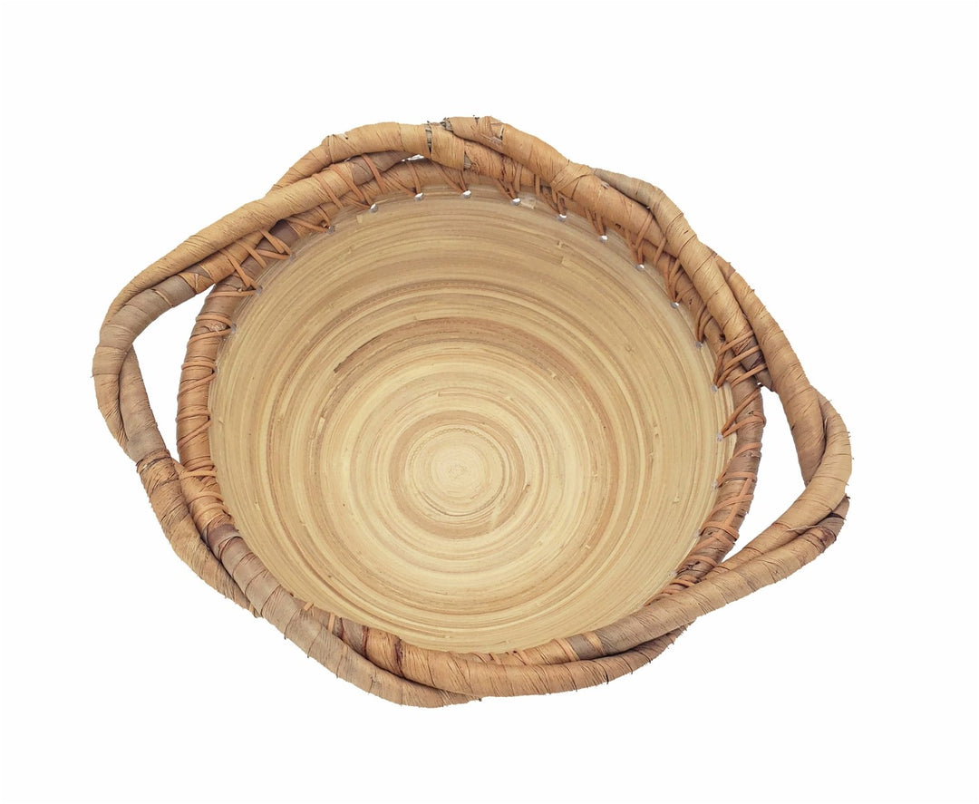 Natural bamboo bowl with woven rim detail, ideal as a decorative centerpiece.