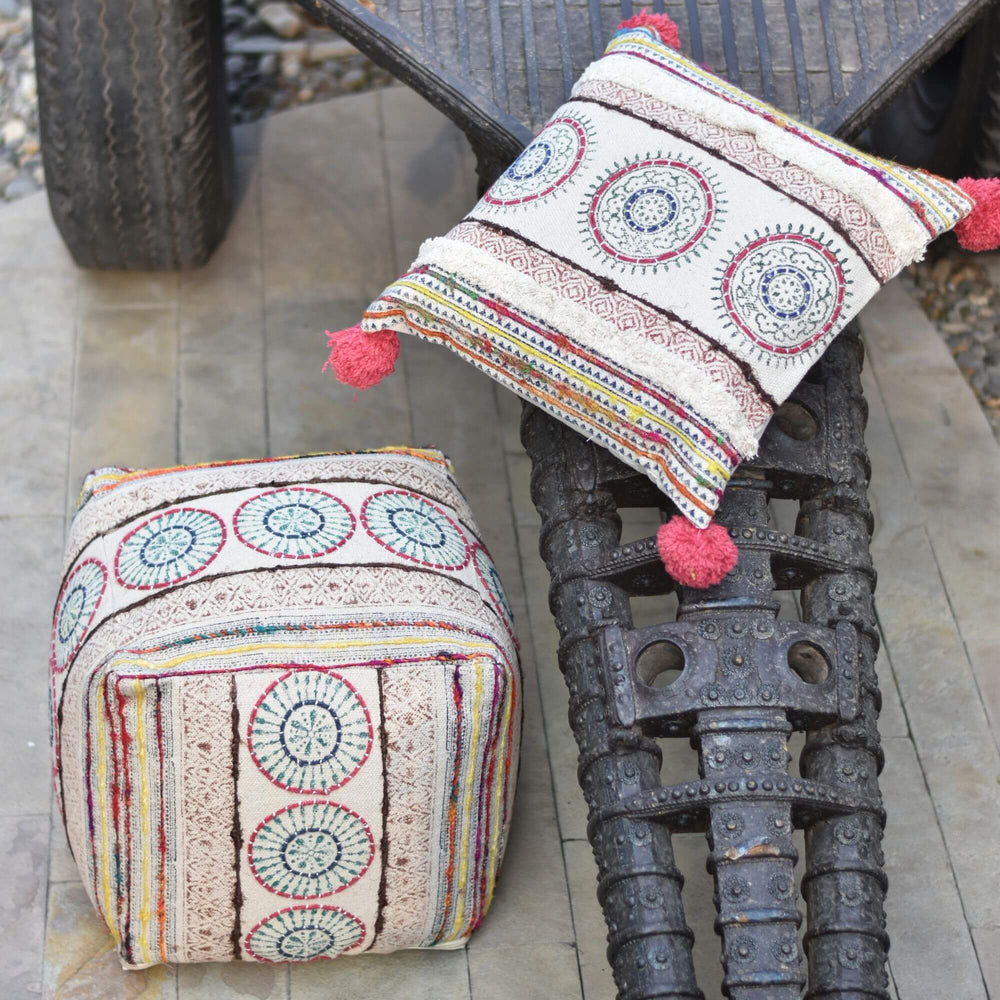 Darjeeling cushion styled on chair highlighting textured fabric and handcrafted details