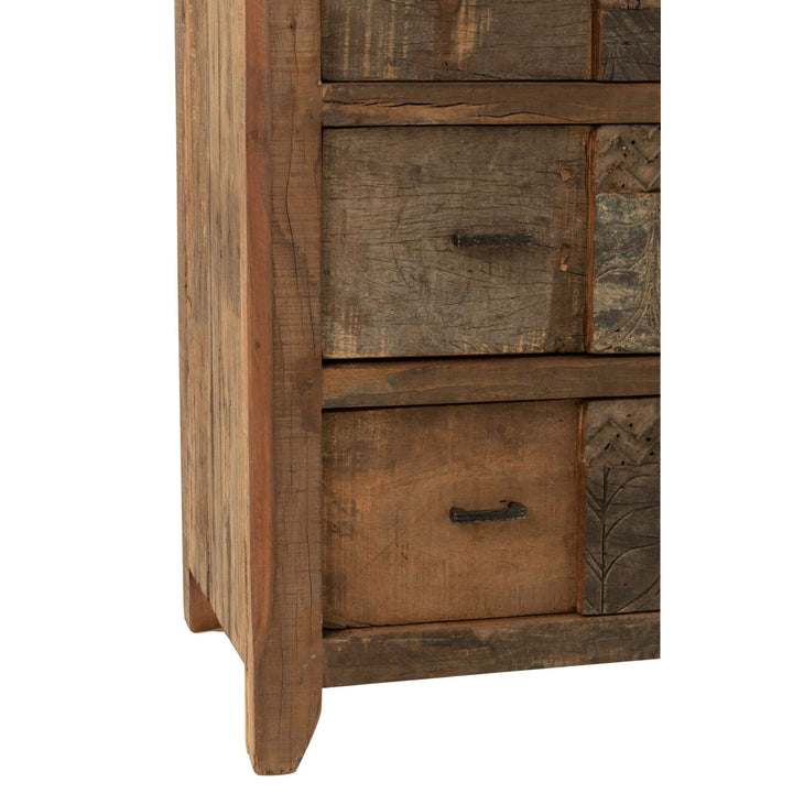 Close-up of distressed multicolor drawer fronts