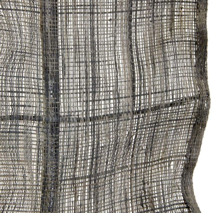 Close-up of woven green natural fiber texture