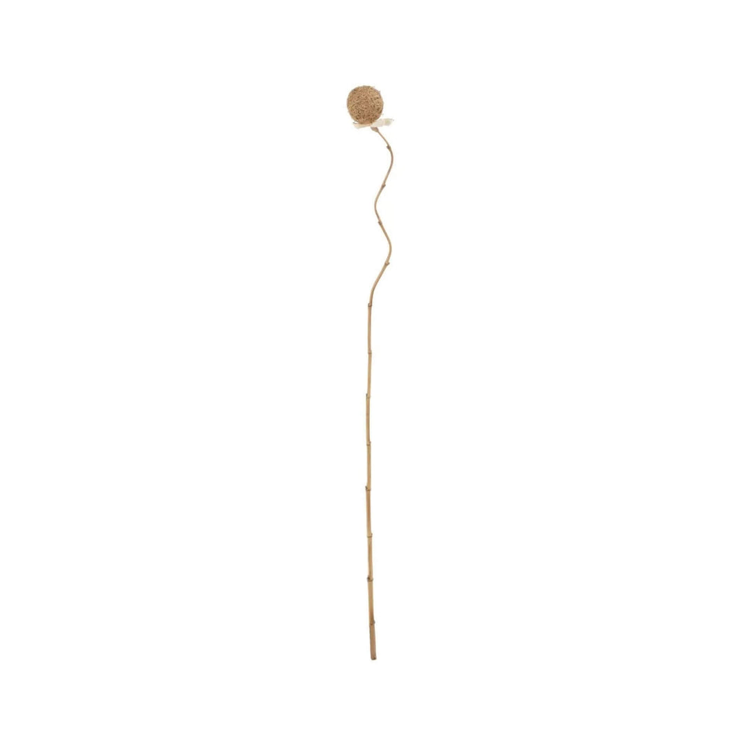 Front view of decorative palm leaf ball with natural fiber sphere and bamboo stem