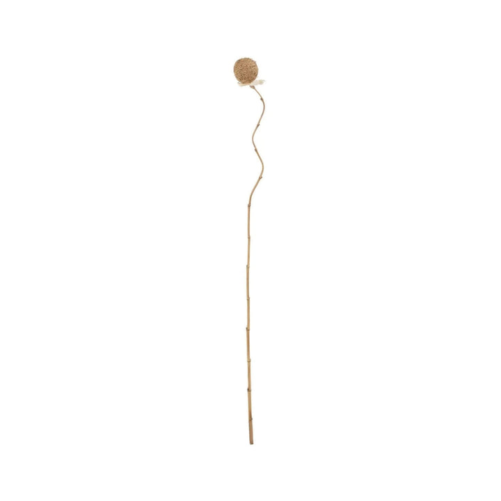 Front view of decorative palm leaf ball with natural fiber sphere and bamboo stem