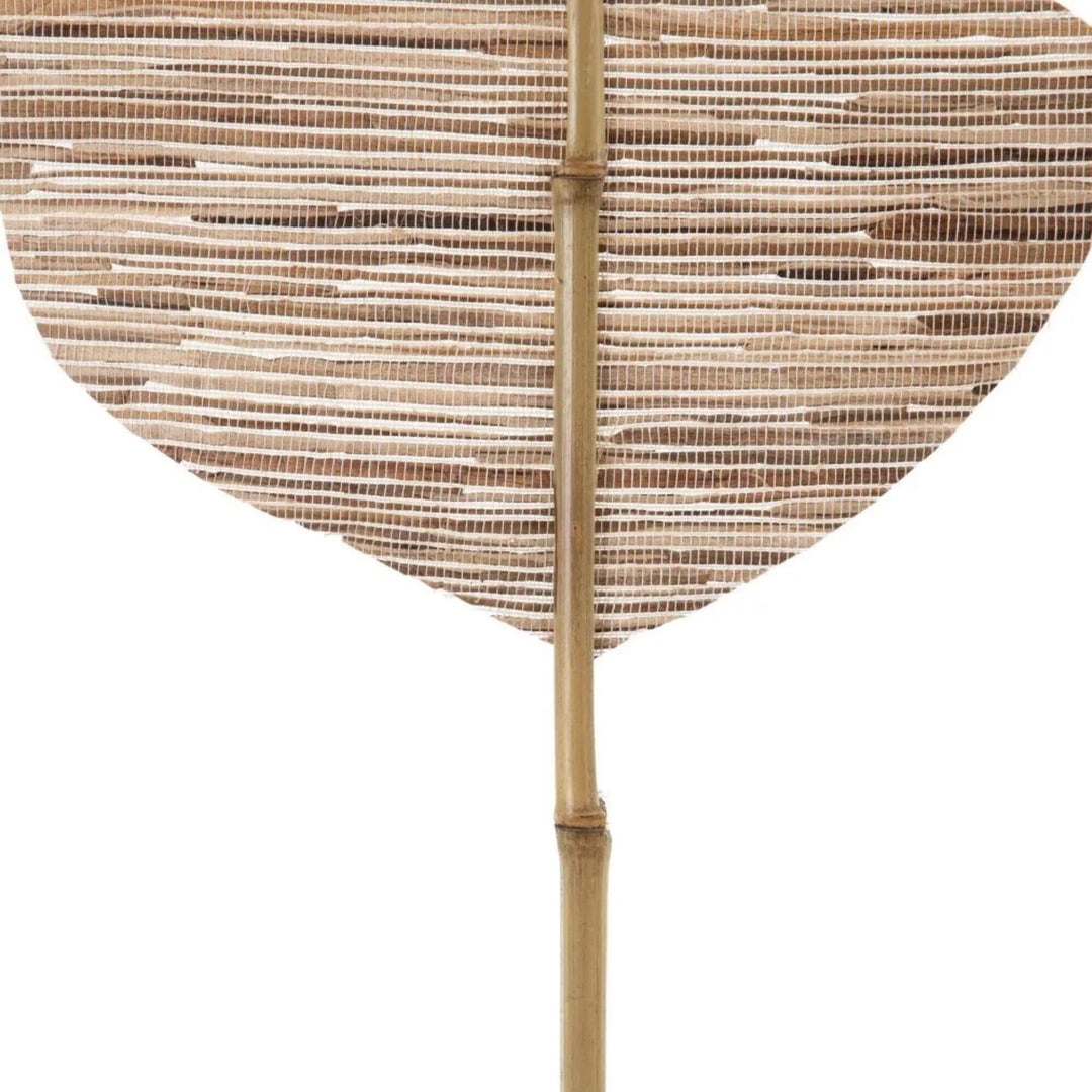 Detail of woven natural fibers and bamboo stem