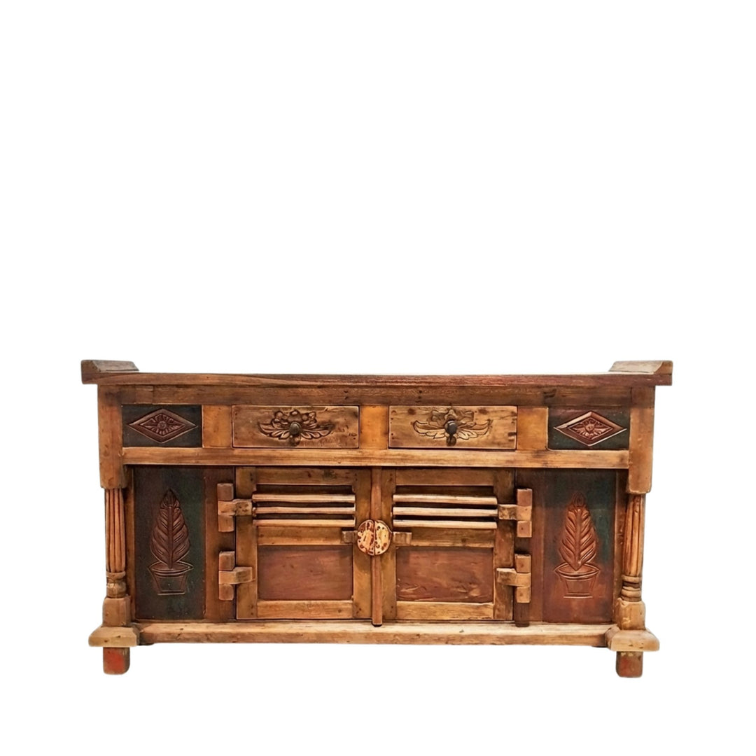 Deirdre Carved teak wood buffet with decorative carvings on a white background