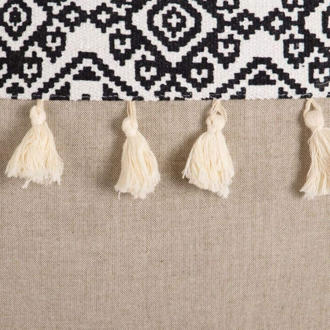 Close-up of cotton tassels and textured fabric detail