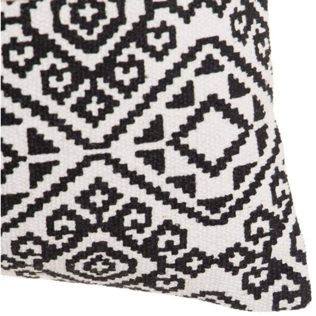 Close-up of cotton tassels and textured fabric detail