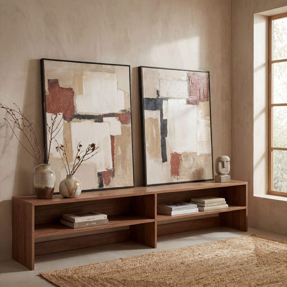 Styled interior setting featuring the Desert Layers artwork displayed above a wooden console in a warm natural space.