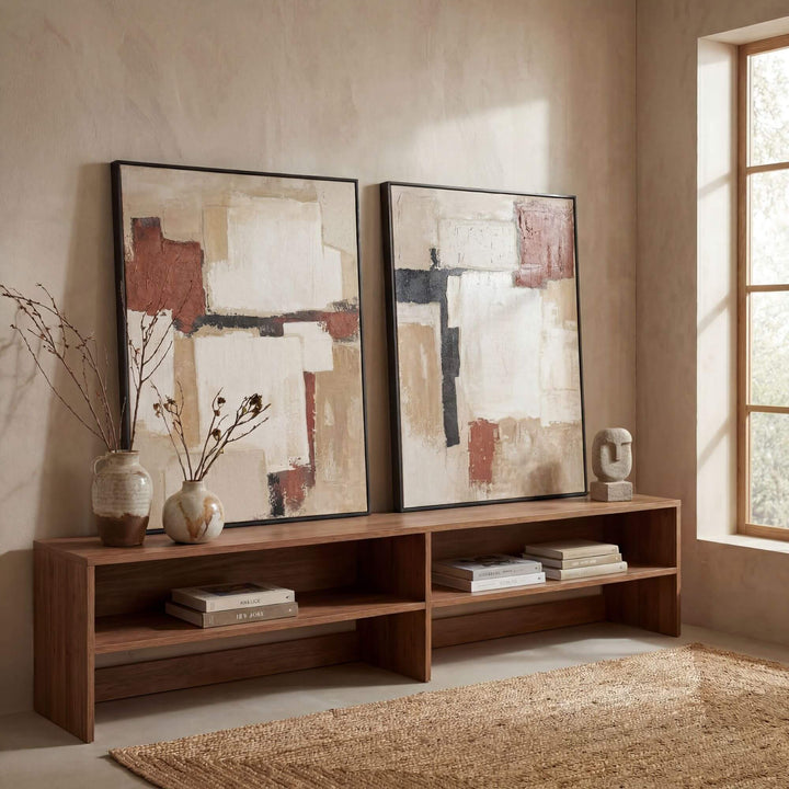 Styled interior setting featuring the Desert Layers artwork displayed above a wooden console in a warm natural space.